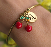 Bracelet jonc avec signe astro lion et pendentif cerise, en acier inoxydable, creation therapietra 