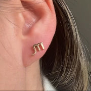Boucles d’oreilles Astro Saturnia pour le Scorpion, bijou intense et magnétique, symbole de transformation.
