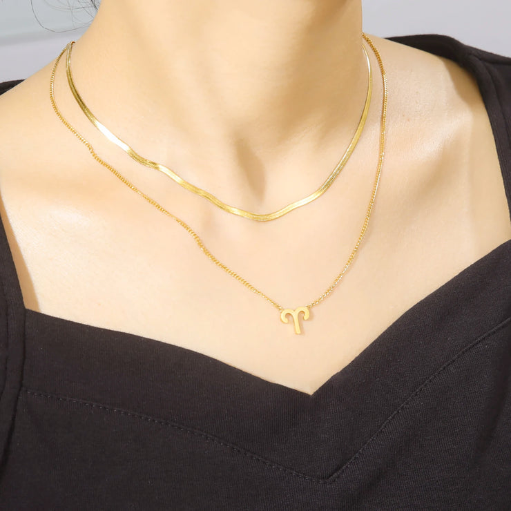 Collier Astro Lyséa doré pour le Bélier, bijou solaire qui incarne la confiance et la force d’agir.