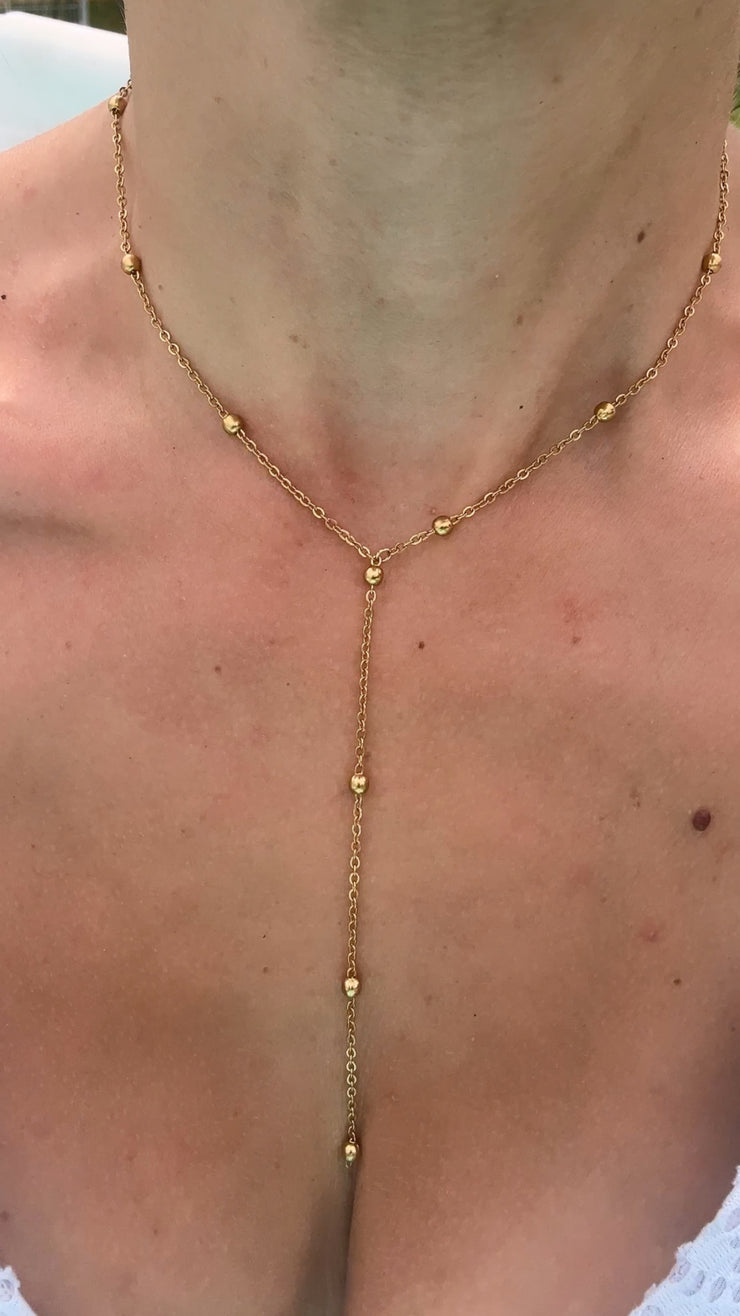 Collier dos nu Bellara en acier inoxydable, bijou raffiné au design sensuel et délicat, création Therapietra.