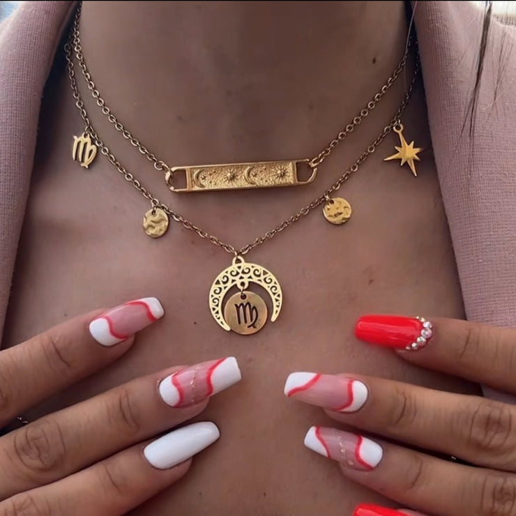 Collier Solennia doré pour femme, bijou éclatant en acier inoxydable inspiré de la chaleur et de l’énergie du soleil.